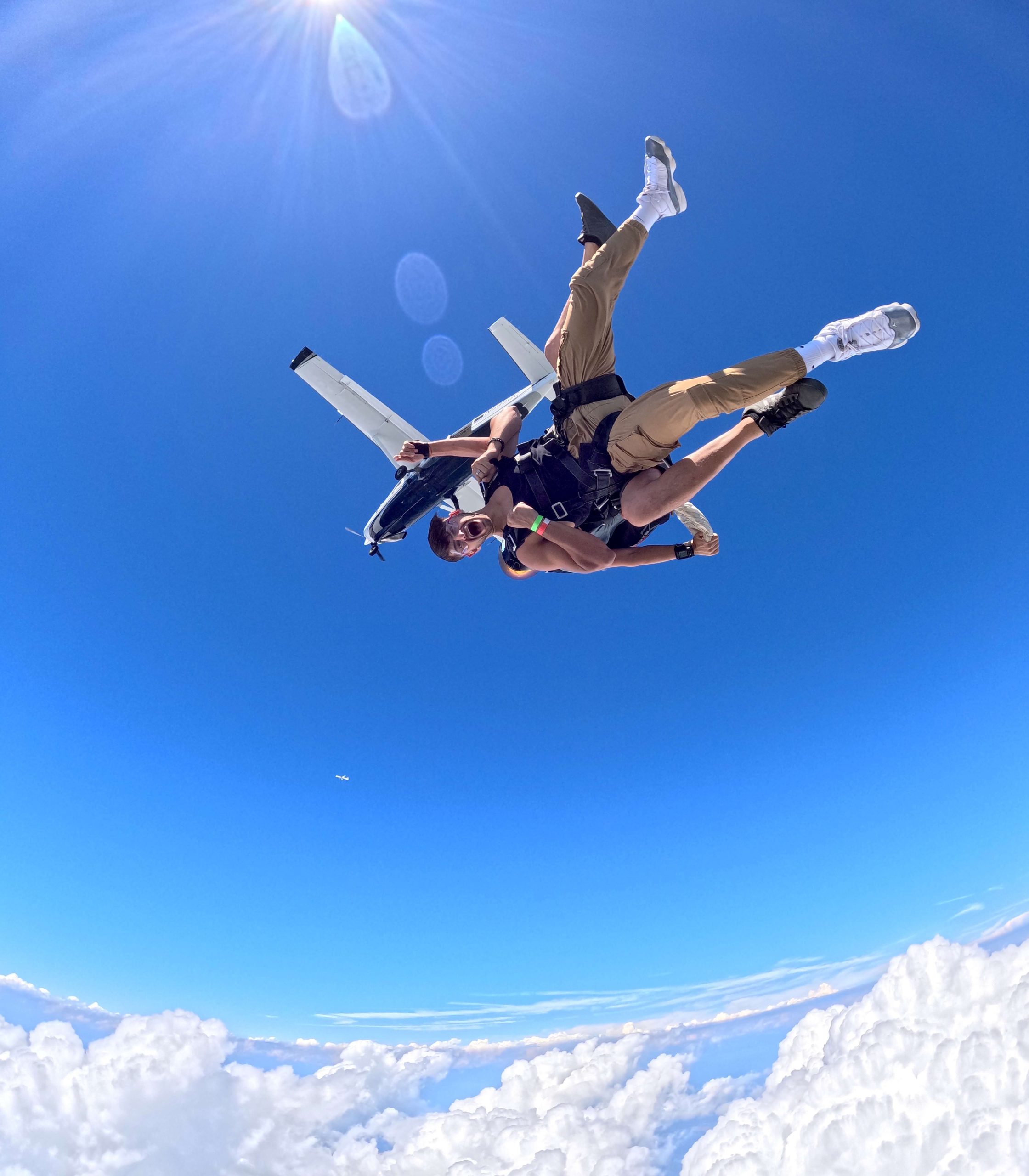 Skydiving through the New York blue skies.