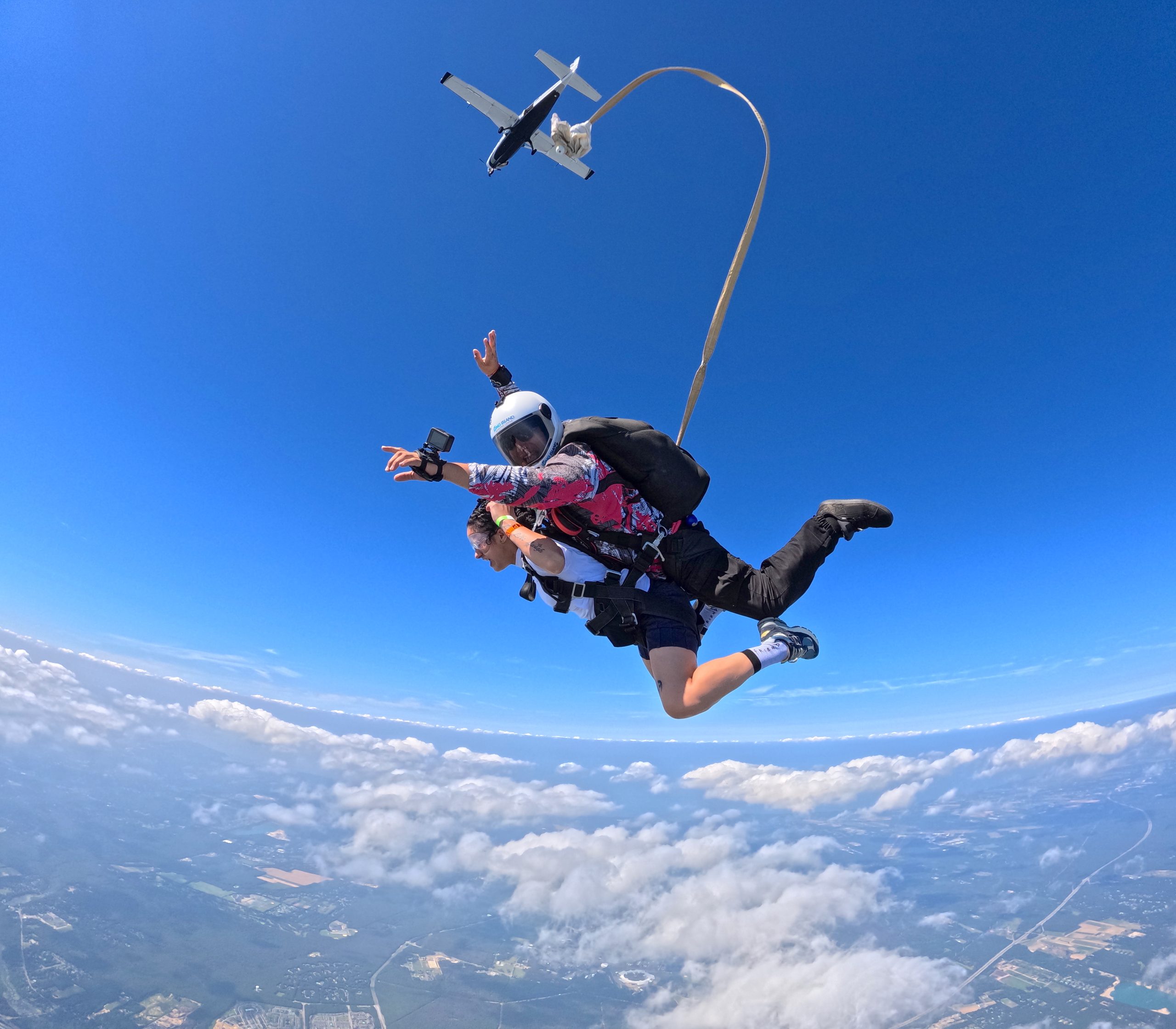 Skydiving above the New York clouds