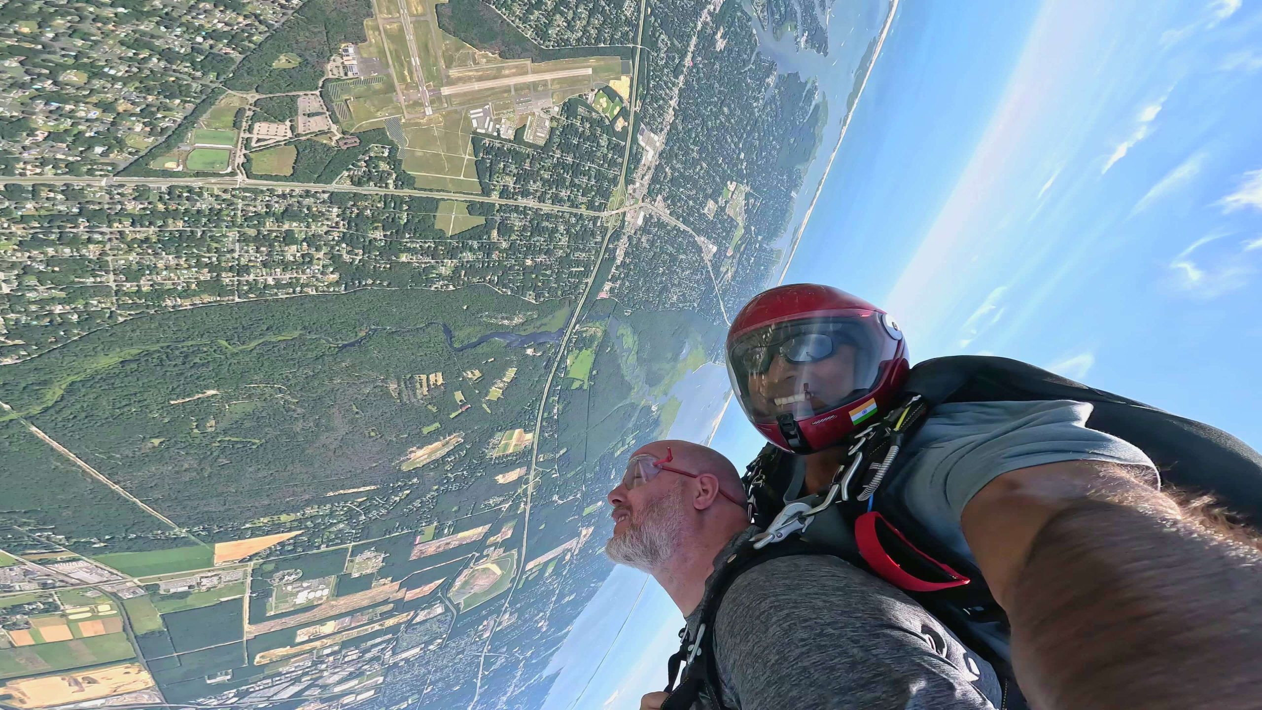 Freefall skydive by the New York coastline.